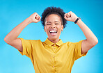Happy woman, fist pump and celebration for winning, promotion or bonus against a blue studio background. African female person enjoying victory, sale or discount in happiness for achievement or goals
