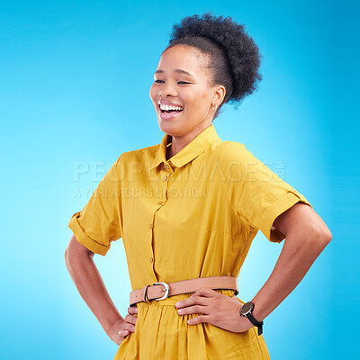 Buy stock photo Happy, laughing and a black woman in studio with funny humor, confidence and a positive mindset. Fashion, hands in hips and african female model person in casual clothes on a blue background