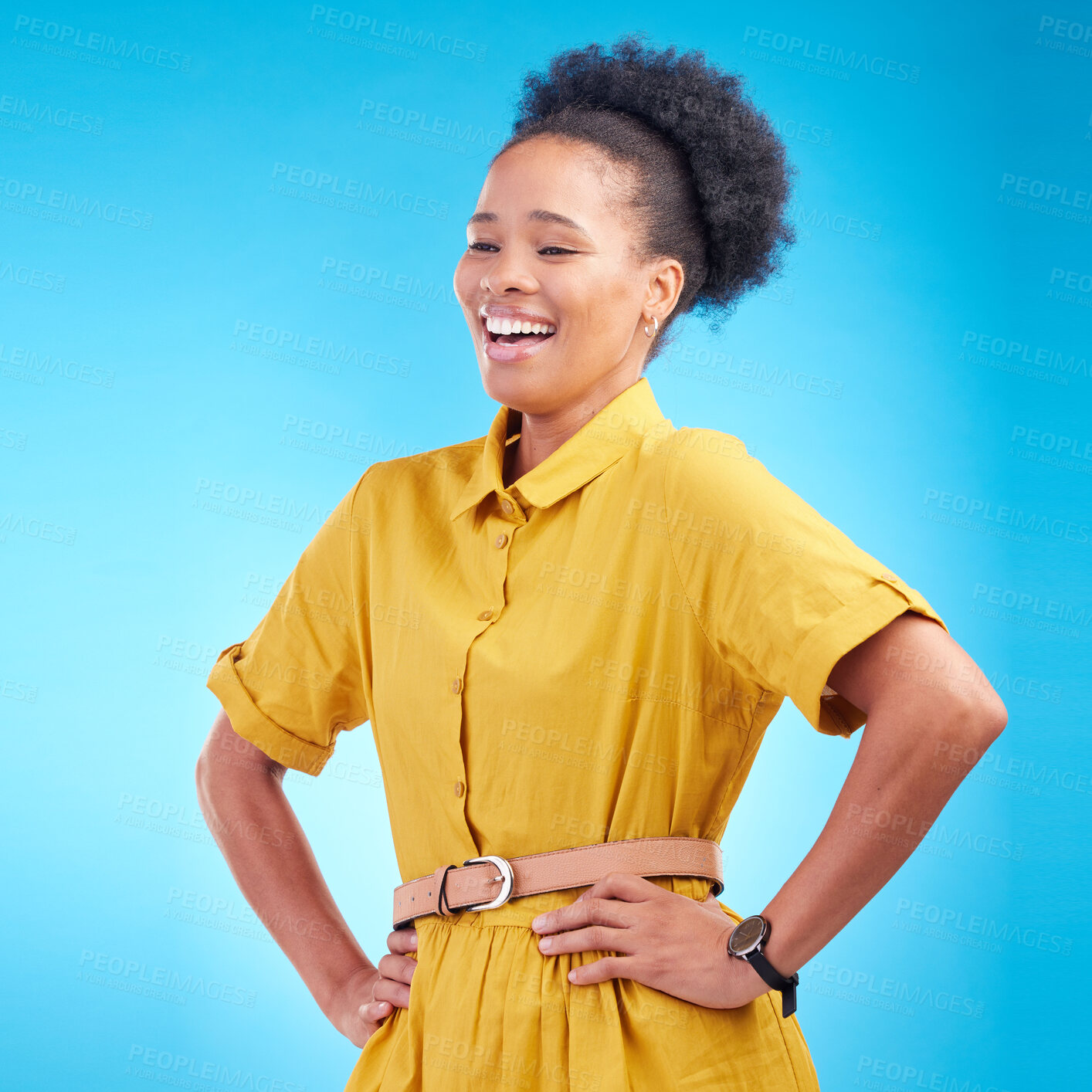 Buy stock photo Happy, laughing and a black woman in studio with funny humor, confidence and a positive mindset. Fashion, hands in hips and african female model person in casual clothes on a blue background