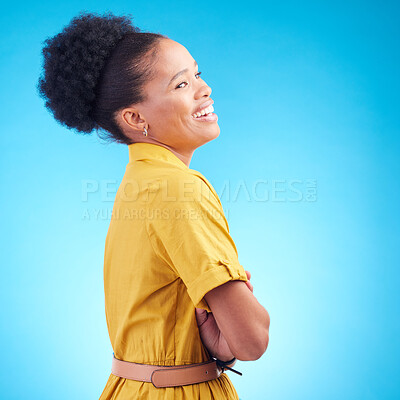 Buy stock photo Happy, laughing and a black woman in studio with funny humor, confidence and a positive mindset. Fashion, arms crossed and profile of a female model person in casual clothes on a blue background