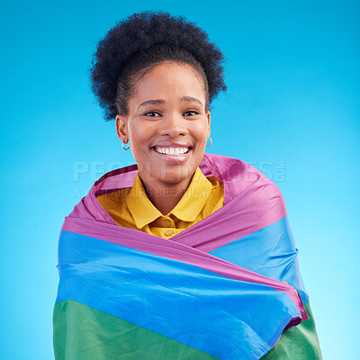 Buy stock photo African woman, pride flag and studio portrait for smile, support or inclusion for lgbtq by blue background. Lesbian girl, rainbow fabric or happy in solidarity, protest or gay freedom for equality