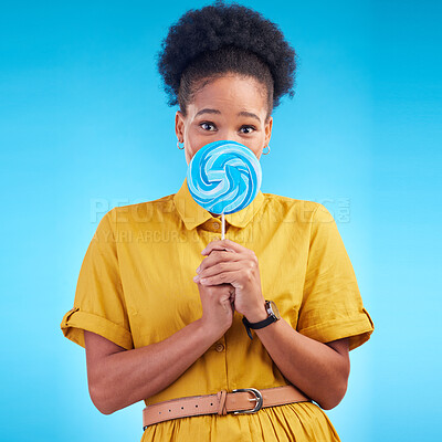 Buy stock photo Happy, candy and portrait of a black woman on a studio background for a lollipop, excited and eating. Freedom, young and an African girl or model with sweets for a snack isolated on a backdrop