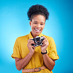 Photography, portrait and black woman with camera, smile and isolated on blue background, creative artist job and talent. Art, face of happy photographer with hobby or career in studio for photoshoot