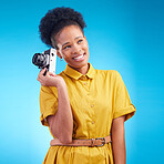 Photography, smile and black woman with camera isolated on blue background, creative artist job and talent. Art, face of happy photographer with hobby or career in studio on travel holiday photoshoot