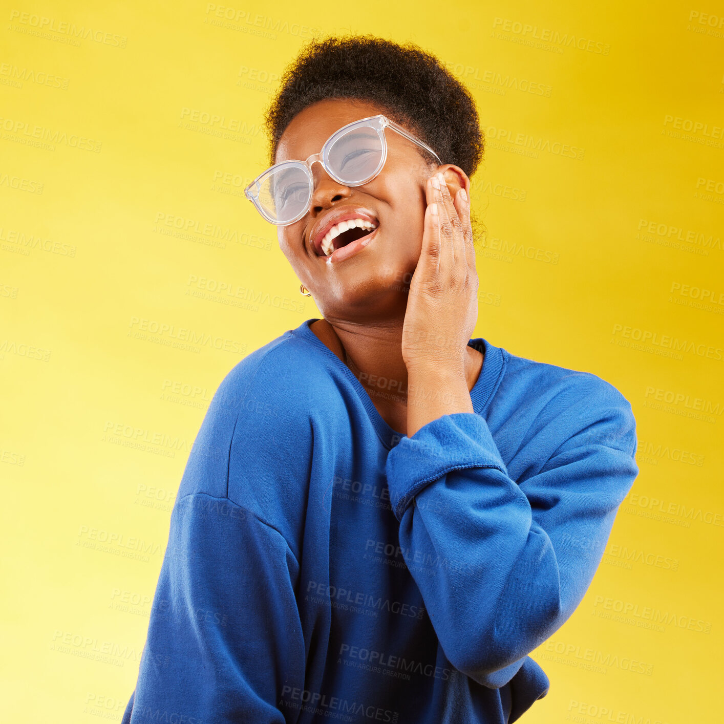 Buy stock photo Fashion, freedom and excited with a black woman on a yellow background in studio for trendy gen z style. Relax, smile and fun with a happy young girl indoor to dance with a carefree expression