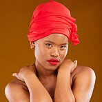 Woman, portrait and red hair scarf with natural beauty, makeup and haircare in studio. Brown background, African female person and cosmetics of a model with head wrap for culture with skincare glow