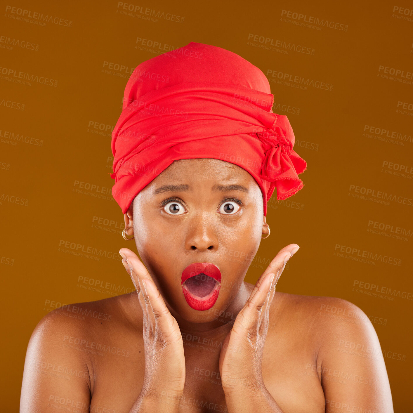 Buy stock photo Portrait, surprise and black woman with makeup, cosmetics or head wrap against a brown studio background. Face, female person or model shocked, creative and dermatology with news, self care and shine