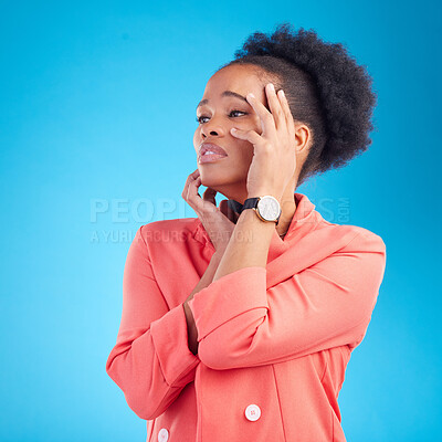 Buy stock photo Faint, thinking and black woman with sad face, fashion and stylish outfit on a blue studio background. Female person and model feeling tired from emotion or drama in elegant clothes and trendy style