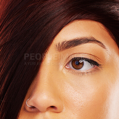 Buy stock photo Vision, hair and eye with a model woman closeup for skincare, beauty or makeup for luxury aesthetic. Face, wellness and a young person with a nose ring in the salon for haircare or cosmetic treatment
