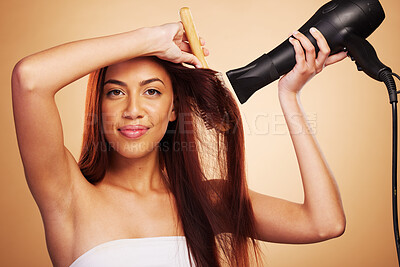 Buy stock photo Hair care, happy and portrait of a woman with a dryer for beauty, styling and treatment. Smile, health and a young girl or model with tools for drying hairstyle isolated on a studio background