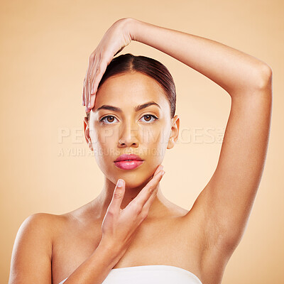 Buy stock photo Portrait, shine and woman with skincare, cosmetics and makeup against a brown studio background. Face, female person or model with luxury, organic facial or self care with wellness, glow or aesthetic