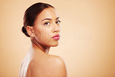 Buy stock photo Portrait, beauty and woman with skincare, cosmetics and dermatology against a brown studio background. Face, female person or model with natural makeup and healthy skin with shine, glow and aesthetic