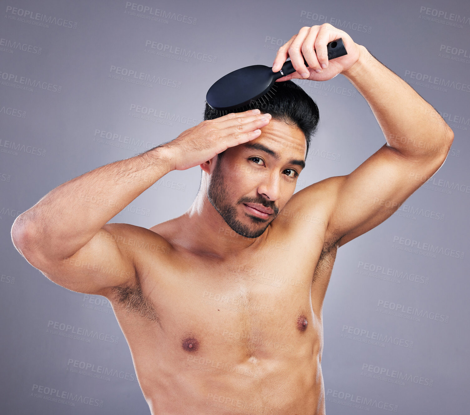 Buy stock photo Portrait, topless or man brushing hair in grooming with salon haircare product on studio background. Natural person, brush or confident healthy Asian male model with cool hairstyle in morning routine