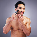 Beard hair trimmer, portrait or happy man with bathroom routine, grooming or morning smile for shaving skincare. Face cleaning, facial growth maintenance or studio person happiness on gray background