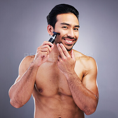 Buy stock photo Beard hair trimmer, portrait or happy man with bathroom routine, grooming or morning smile for shaving skincare. Face cleaning, facial growth maintenance or studio person happiness on gray background