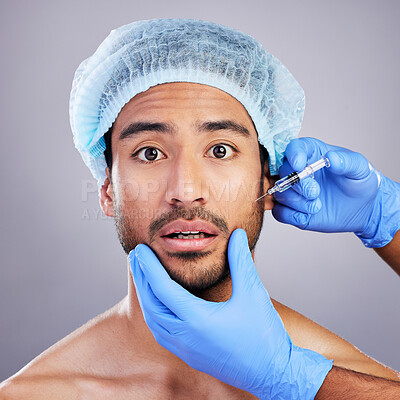 Buy stock photo Hands, portrait and plastic surgery with a man in studio on a gray background for a botox injection. Face, beauty and transformation with a male customer in a clinic for antiaging filler or cosmetics