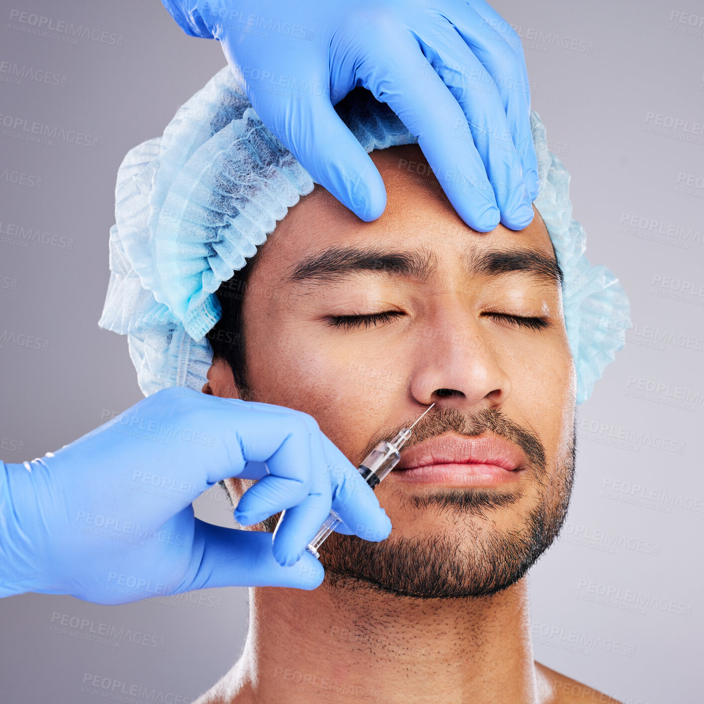 Buy stock photo Hands, facelift and plastic surgery with a man in studio on a gray background for a botox injection. Face, change and transformation with a male customer in a clinic for beauty or antiaging filler