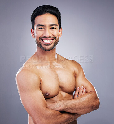 Buy stock photo Skincare portrait, studio arms crossed and happy man with morning treatment, hygiene health or body wellness. Bathroom, self care and confident person smile for cosmetics results on gray background