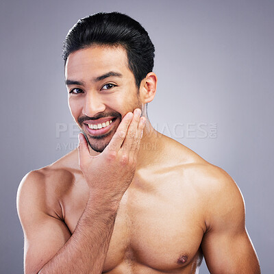 Buy stock photo Portrait, skincare and man with beauty, dermatology and wellness against a grey studio background. Face, male person or happy model with self care, beard and health with wellness, cosmetics and shine