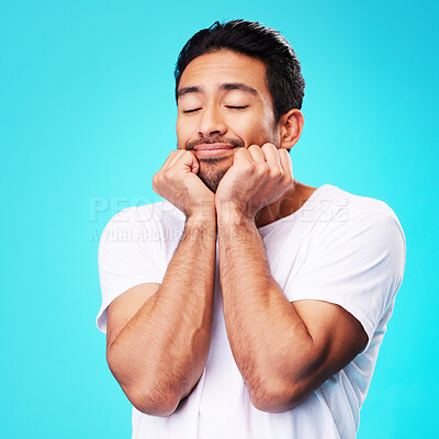 Buy stock photo Calm, relax and man face in studio with sleeping with memory, smile and thinking to remember. Isolated, blue background and happy male model with eyes closed for rest and nap feeling thoughtful