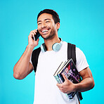 Talking, phone and college student in studio with backpack for university, education and talking with books on blue background. Happy, man and person excited for social media, network and connection