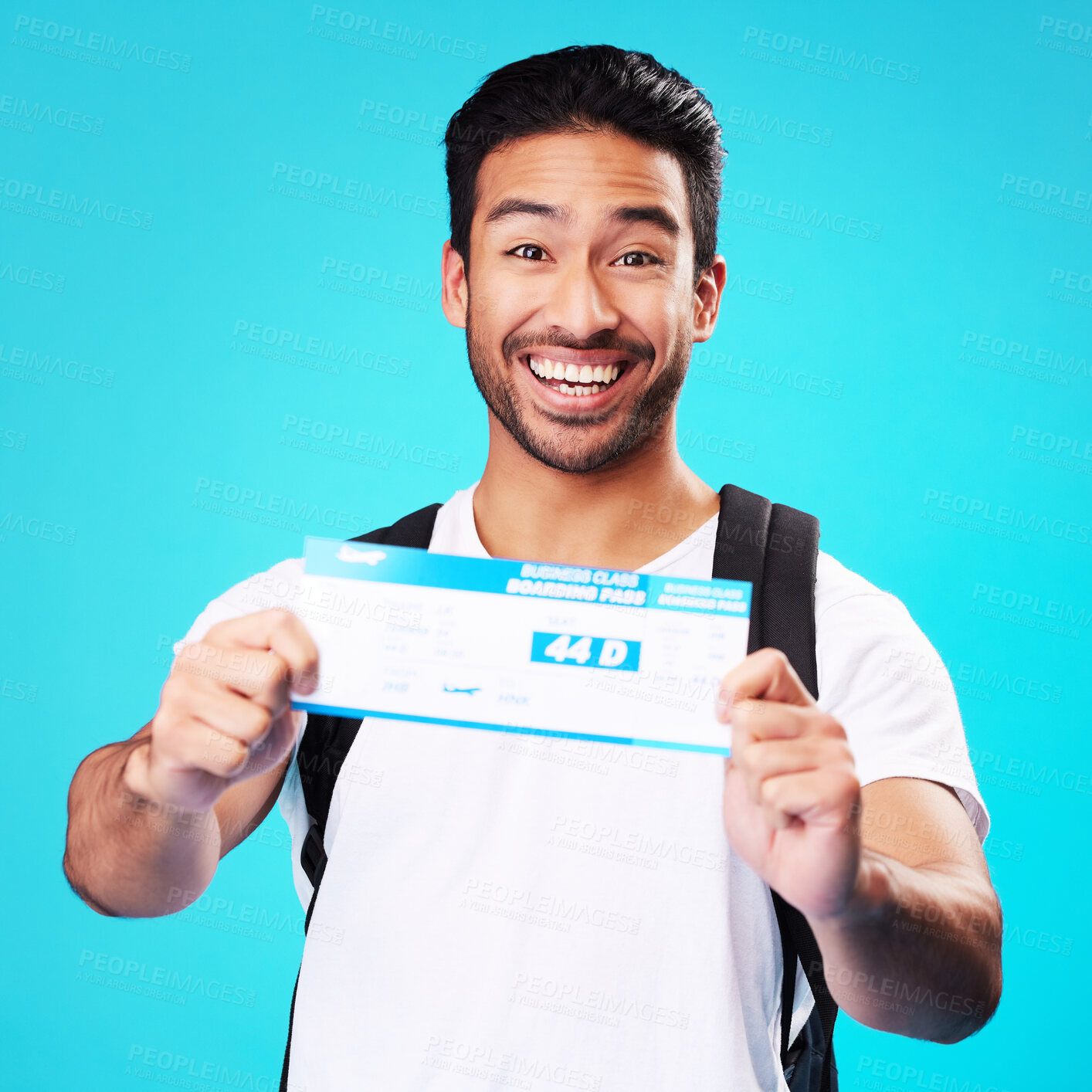 Buy stock photo Travel, ticket and portrait of Asian man happy for holiday or vacation flight isolated in a studio blue background. Smile, winning and young person with tourist discount, deal and promo for a trip