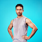 Portrait, fitness and confident Asian man sweat in studio isolated on a blue background. Face, serious and personal trainer with exercise, workout or sports for healthy body or wellness in Cambodia
