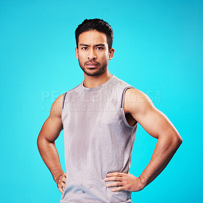 Buy stock photo Portrait, fitness and confident Asian man sweat in studio isolated on a blue background. Face, serious and personal trainer with exercise, workout or sports for healthy body or wellness in Cambodia