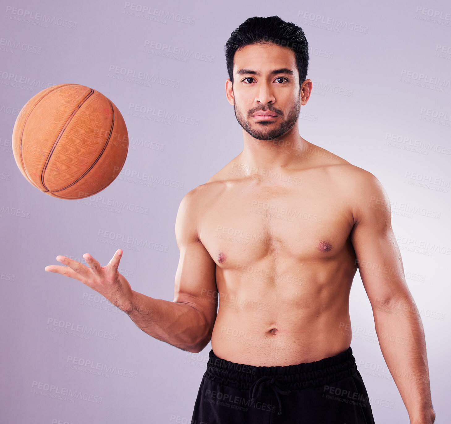 Buy stock photo Portrait, sports and basketball with a man in studio on a gray background for training or a game. Exercise, workout or mindset and a confident young male athlete with a ball for a competitive hobby