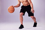 Fitness, basketball and bounce with a sports man in studio on a gray background for training or a game. Exercise, workout or dribble and a shirtless male athlete playing ball with skill or technique