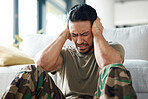 Soldier, man and stress, headache or PTSD of military trauma, remember pain and fear or scared on floor. Sad, frustrated and mental health of army or veteran person with depression or anxiety at home