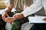 Therapy, soldier and people holding hands with checklist for mental health support, helping and counseling service. Therapy, psychology and empathy of army or military man on sofa and doctor document