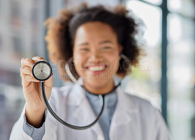 Buy stock photo Doctor, hands and woman listening with stethoscope for heartbeat, healthcare services or cardiology. Closeup of female medical worker with tools to check heart, lungs and breathing test in hospital 