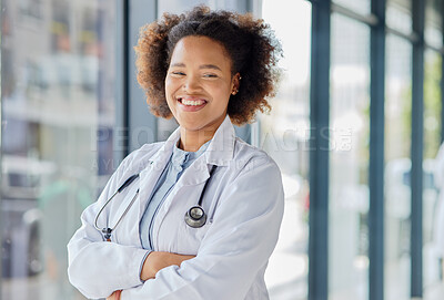 Buy stock photo Happy black woman, portrait and doctor with arms crossed in clinic for wellness services, help or medical consulting. Medicine, healthcare and young female professional working with trust in hospital