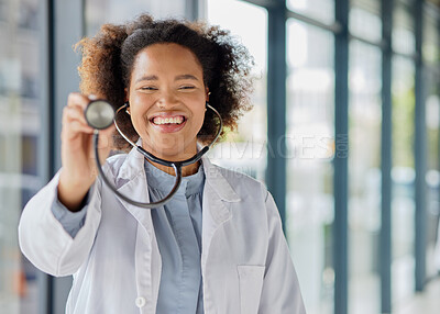 Buy stock photo Doctor, portrait and woman listening with stethoscope for heartbeat, healthcare and cardiology. Happy black female medical worker with tools to check heart, lungs or breathing test for help in clinic
