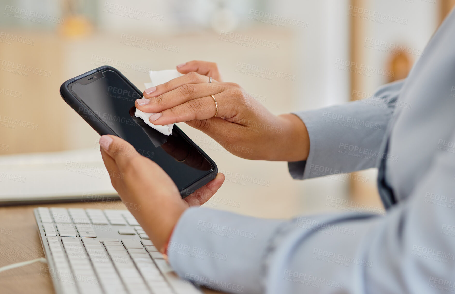 Buy stock photo Woman, hands and cleaning phone in office for mockup space of hygiene, health and virus safety. Closeup of worker wipe dirt on mobile screen with tissue for sanitation, disinfection and dust bacteria