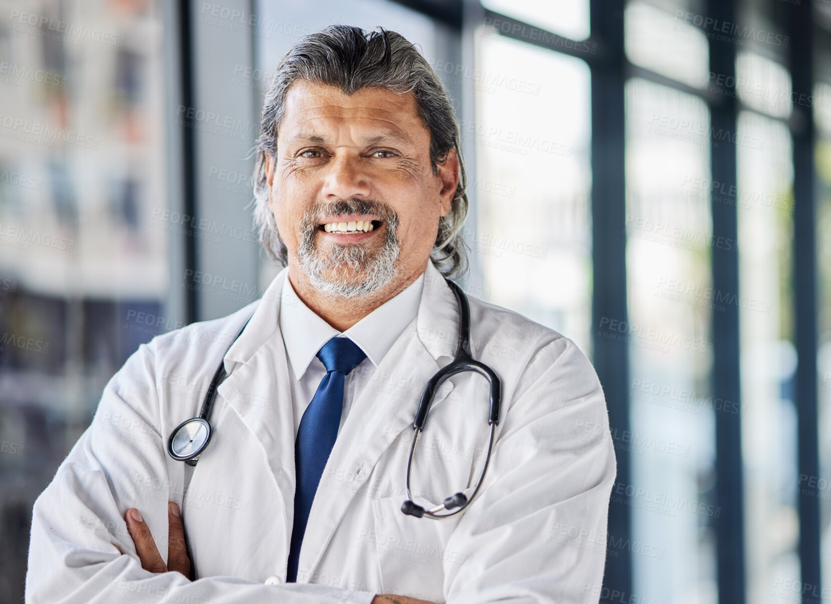 Buy stock photo Doctor, healthcare portrait and arms crossed in clinic or hospital of patient support, leadership or management. Face of senior medical person with professional health services and proud job