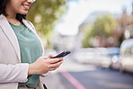 Outdoor, cellphone and business woman with reading for  communication on internet or online app. Professional female, hands and typing with technology in street for information or social media.
