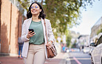 Phone, walking and a business woman outdoor in a city with communication, internet connection and app. Happy professional person, urban road and smartphone for message, chat or social media on travel