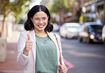 Thumbs up, portrait and business woman in the city, street or professional worker with success, agreement or thank you. Hand, sign and happy worker in urban, town or walking to office building