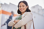 Business woman, arms crossed and portrait outdoor in city with job travel and smile. Urban, face and female professional with bag for career and commute to work feeling happy and proud from success