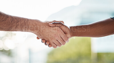 Buy stock photo Help, support and handshake by men outdoor with trust, cooperation or collaboration on blurred background. People, shaking hands and friends for teamwork, thank you or partnership, deal or solidarity