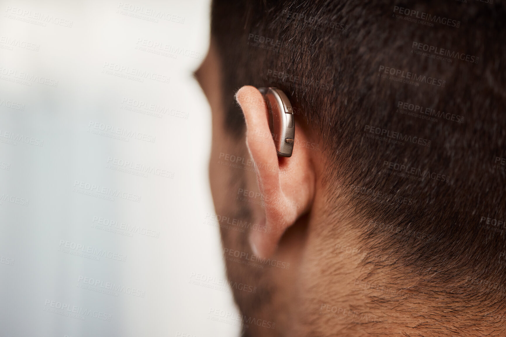 Buy stock photo Closeup of hearing aid, ear and man with disability from the back for medical support, listening or healthcare at mockup space. Deaf patient, face and audiology implant to help volume of sound waves