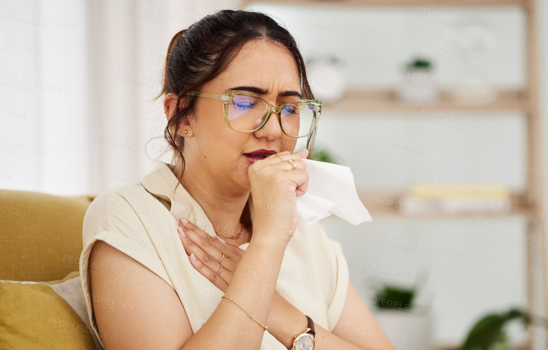 Buy stock photo Coughing, tissue and sick woman on a sofa with cold, flu or sore throat in her home. Allergies, influenza and female with viral infection, bacteria and covid risk in a living room with tuberculosis 