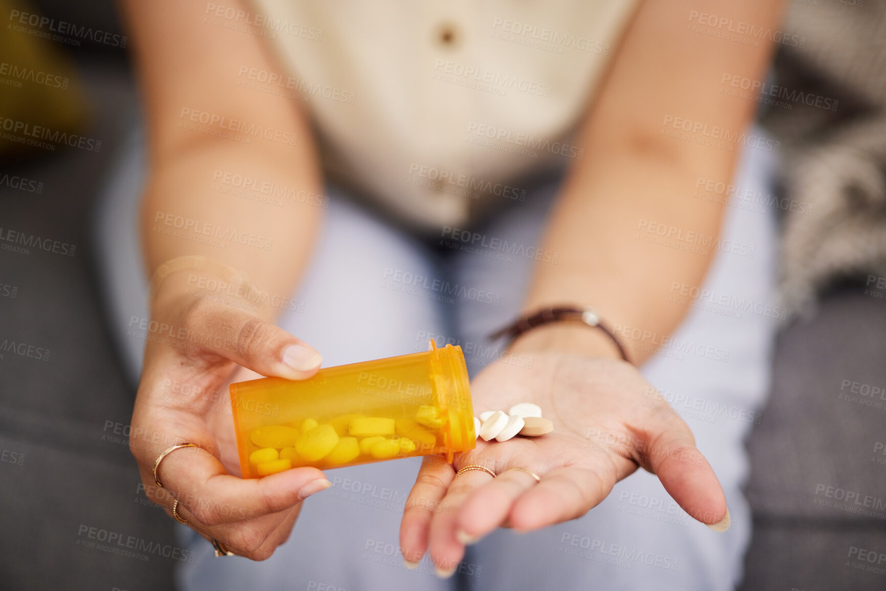 Buy stock photo Woman hands, medicine and bottle of tablet, iron supplements and daily vitamins at home. Closeup, container of pills and prescription drugs in palm of sick person for medical, product and healthcare