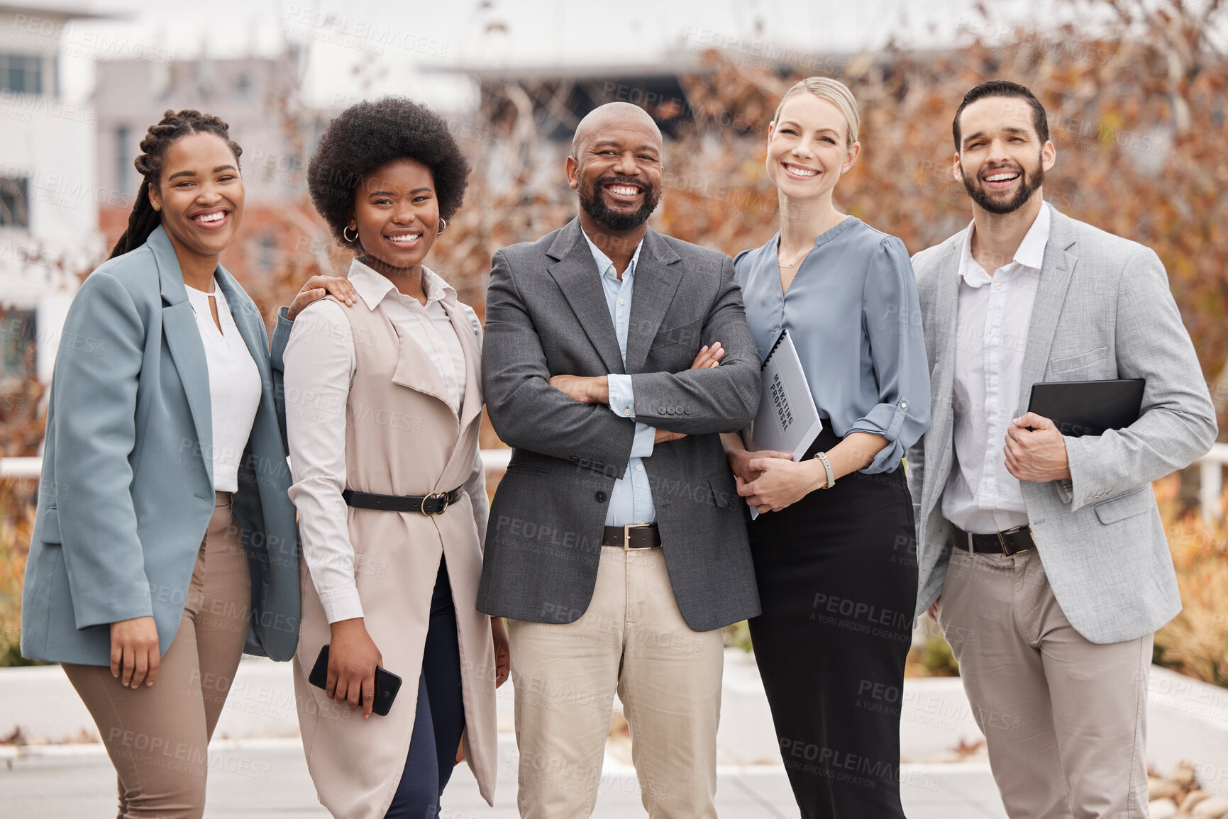 Buy stock photo Team, portrait and business people with arms crossed in the city for corporate teamwork and diversity. Smile, together and a group of employees with pride, trust and professional solidarity for work