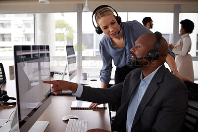 Buy stock photo Call center training, talking and employee with a manager for help, advice or telemarketing work. Diversity, computer and a black man and woman in customer service coaching and discussion at a desk