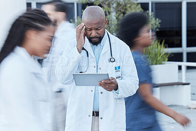 Buy stock photo Tablet, black man and doctor with stress in busy hospital, fatigue or burnout. Tech, medical professional or person with problem, crisis or challenge, headache or anxiety in mistake, fail or disaster