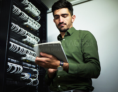 Buy stock photo Engineer man, cable and server room with a tablet for programming, maintenance and software upgrade. Young male technician person with technology in data center for wire, hardware and internet