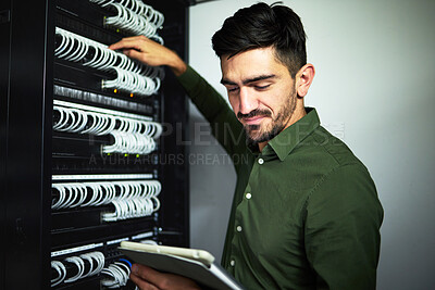 Buy stock photo Cable, engineer man and data center with a tablet for programming, maintenance and software upgrade. Male IT technician person with technology in server room for wire, hardware or internet connection
